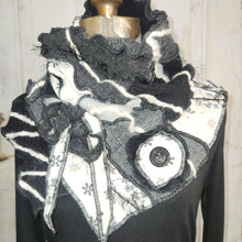 Load image into Gallery viewer, A black and white gothic-style scarf with lace, ruffles, and a large eye applique, displayed on a mannequin torso.