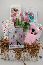 Load image into Gallery viewer, self care gift set, spa gift basket, floral soap set, handmade soap, beauty tools, womenโs gift box, birthday gift for her, bath and body gift, skincare tools, lash curler, silicone brush holder, relaxation set, wellness gift, Mother's Day gift, pamper box
