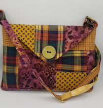 Load image into Gallery viewer, Handmade patchwork purse
Boho crossbody bag
Quilted fabric handbag
Unique fabric shoulder bag
Vintage button flap purse
Colorful patchwork bag
Women's boho chic handbag
Festival crossbody purse
One-of-a-kind patchwork clutch
Artisan made fabric purse
crossbody bag, women's handbag, boutique green bay, upcycled, recycled bag, shoulder bag