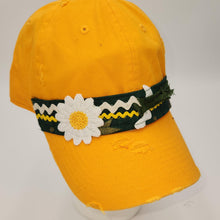 Load image into Gallery viewer, A yellow distressed baseball cap with a dark green and yellow patterned band and a white daisy applique on the front,  green bay packers hat
