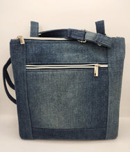 Load image into Gallery viewer, upcycled denim bag, handmade crossbody purse, floral appliqué shoulder bag, eco friendly tote, recycled jeans bag, boho denim handbag, sustainable fashion accessory, handmade shoulder bag, unique denim purse, artisan fabric bag, repurposed fabric crossbody

