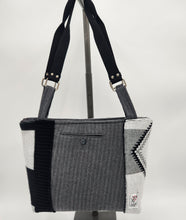 Load image into Gallery viewer, handmade knitted shoulder bag

black and gray tote purse

floral accent handbag

unique boutique bag

knitted geometric purse

durable everyday tote
